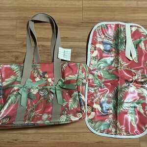 NWT Laminated diaper bag with changing pad from "3 Marthas". Pink floral color.